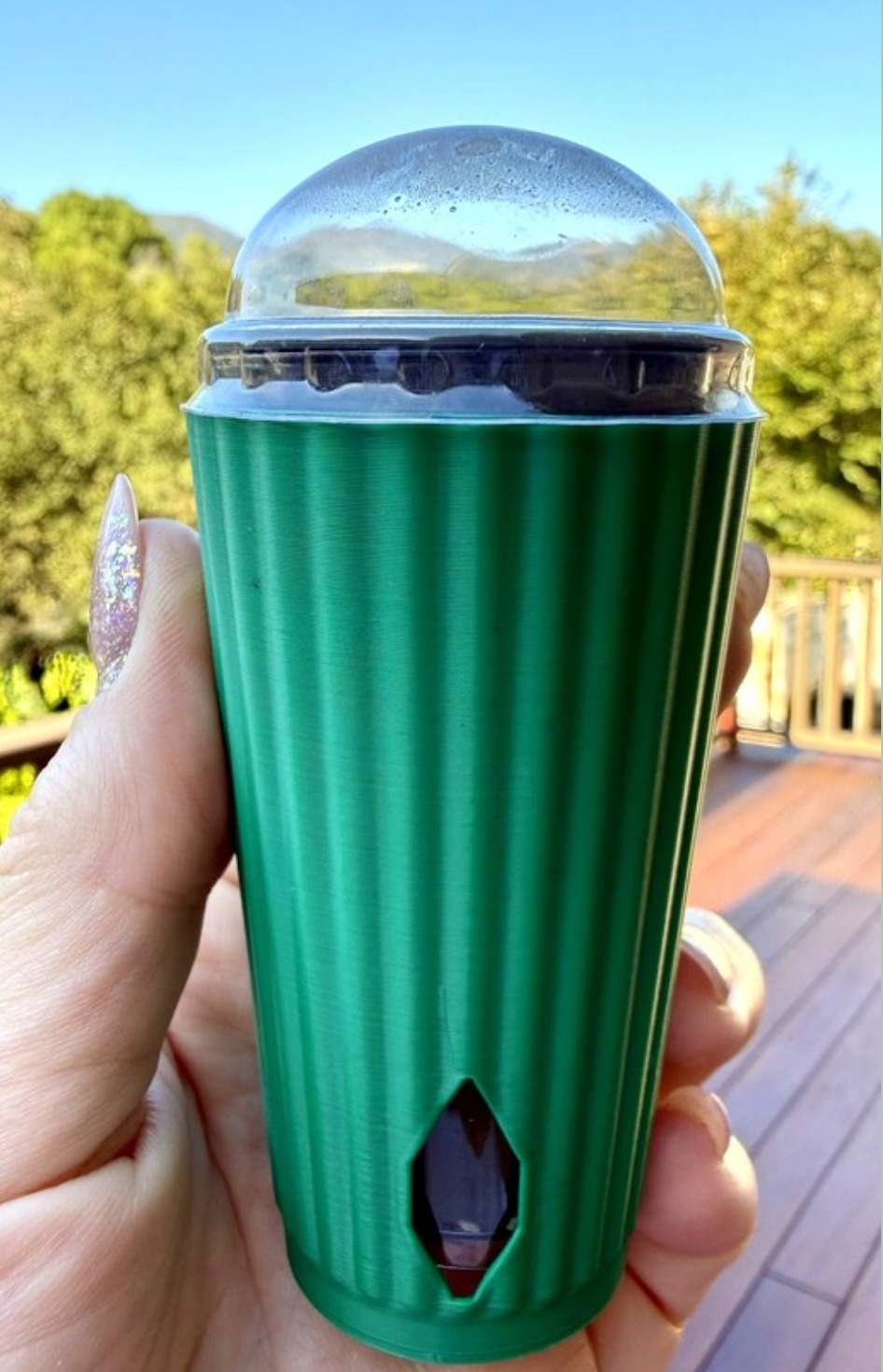 1.75″ cover pot in hand with the small humidity dome on